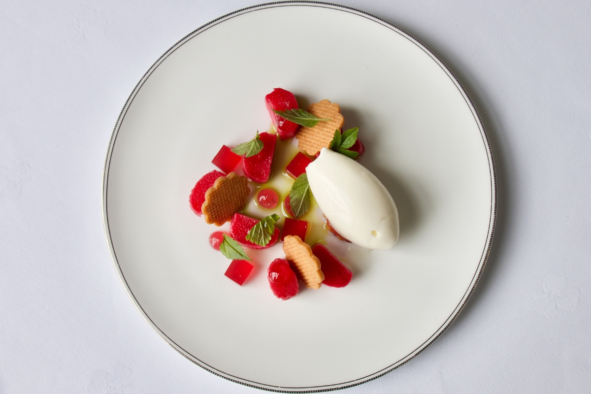 a plate of food on a white surface