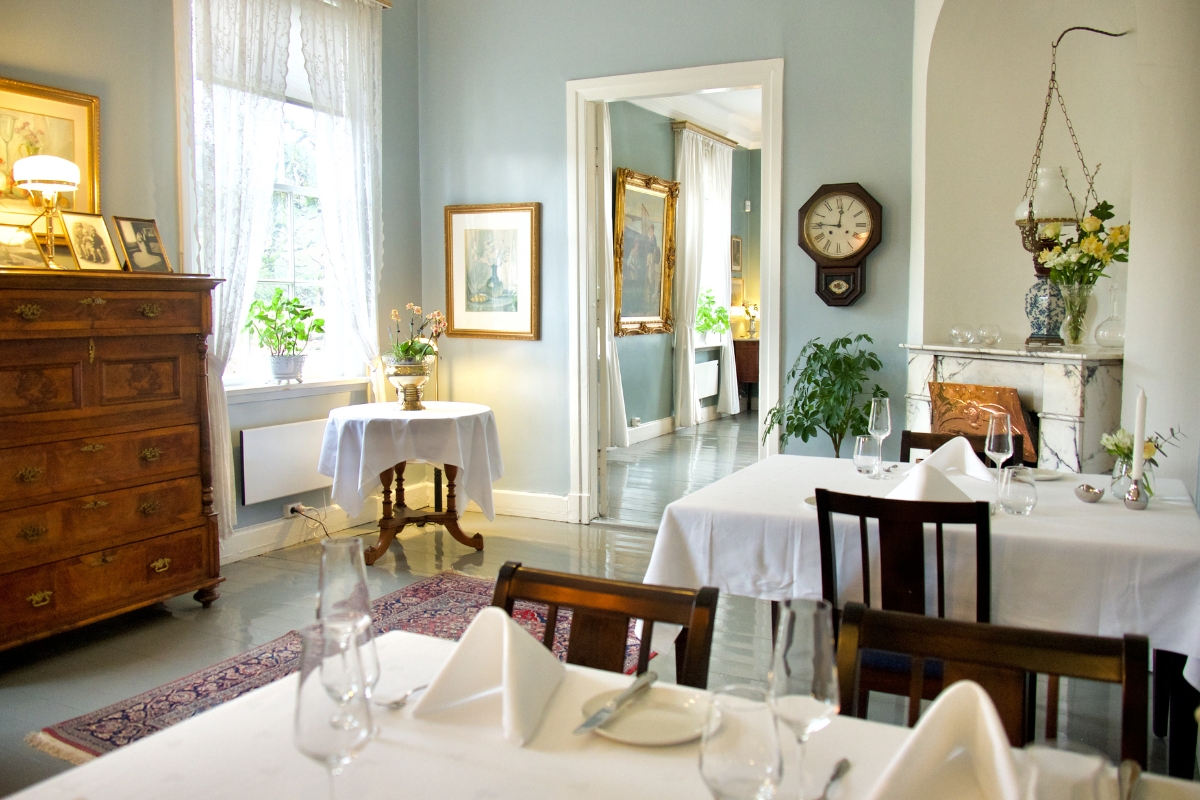 a room with tables and chairs