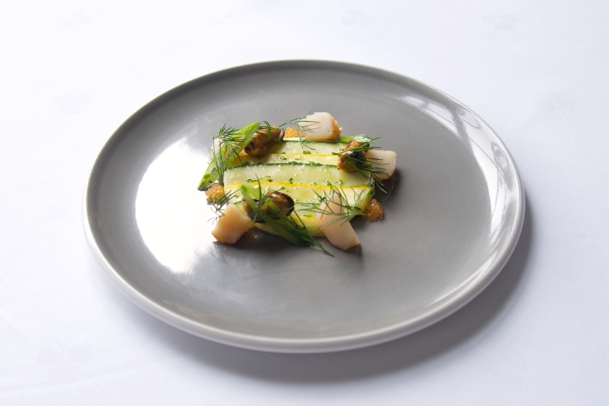 a plate of food on a white surface