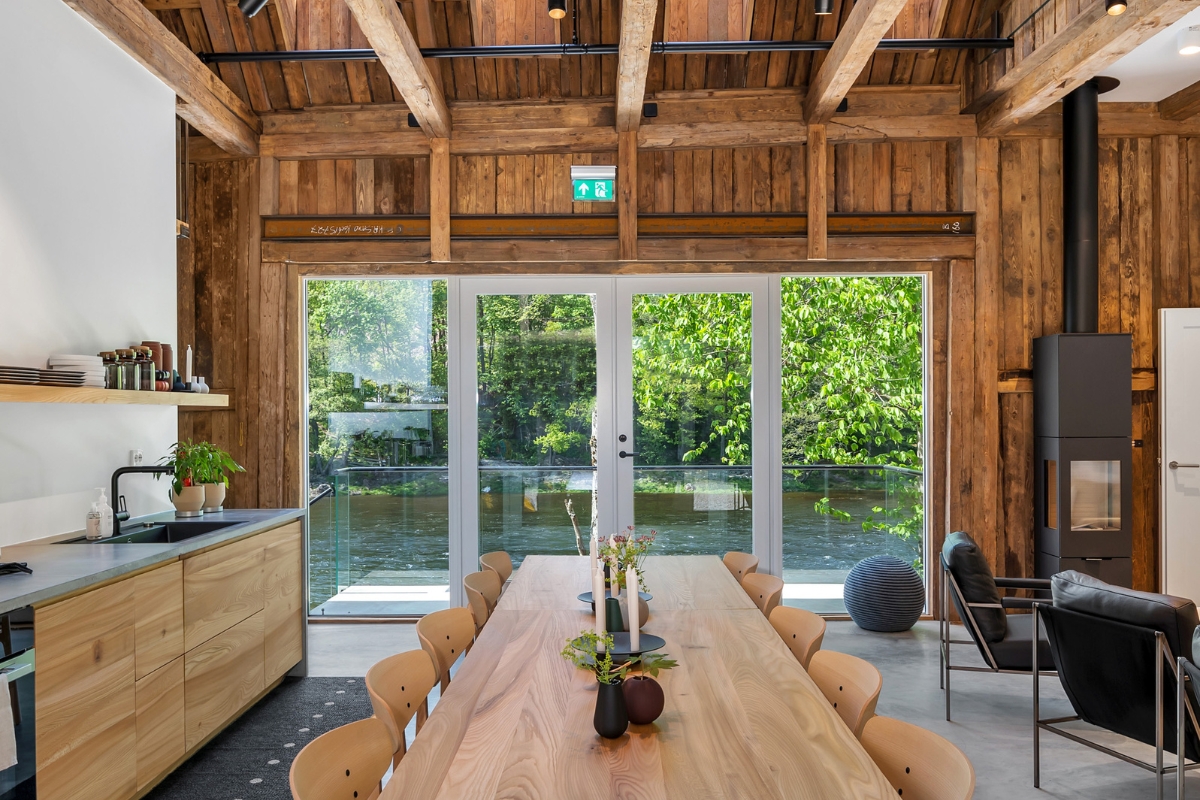a dining table in a room with glass doors