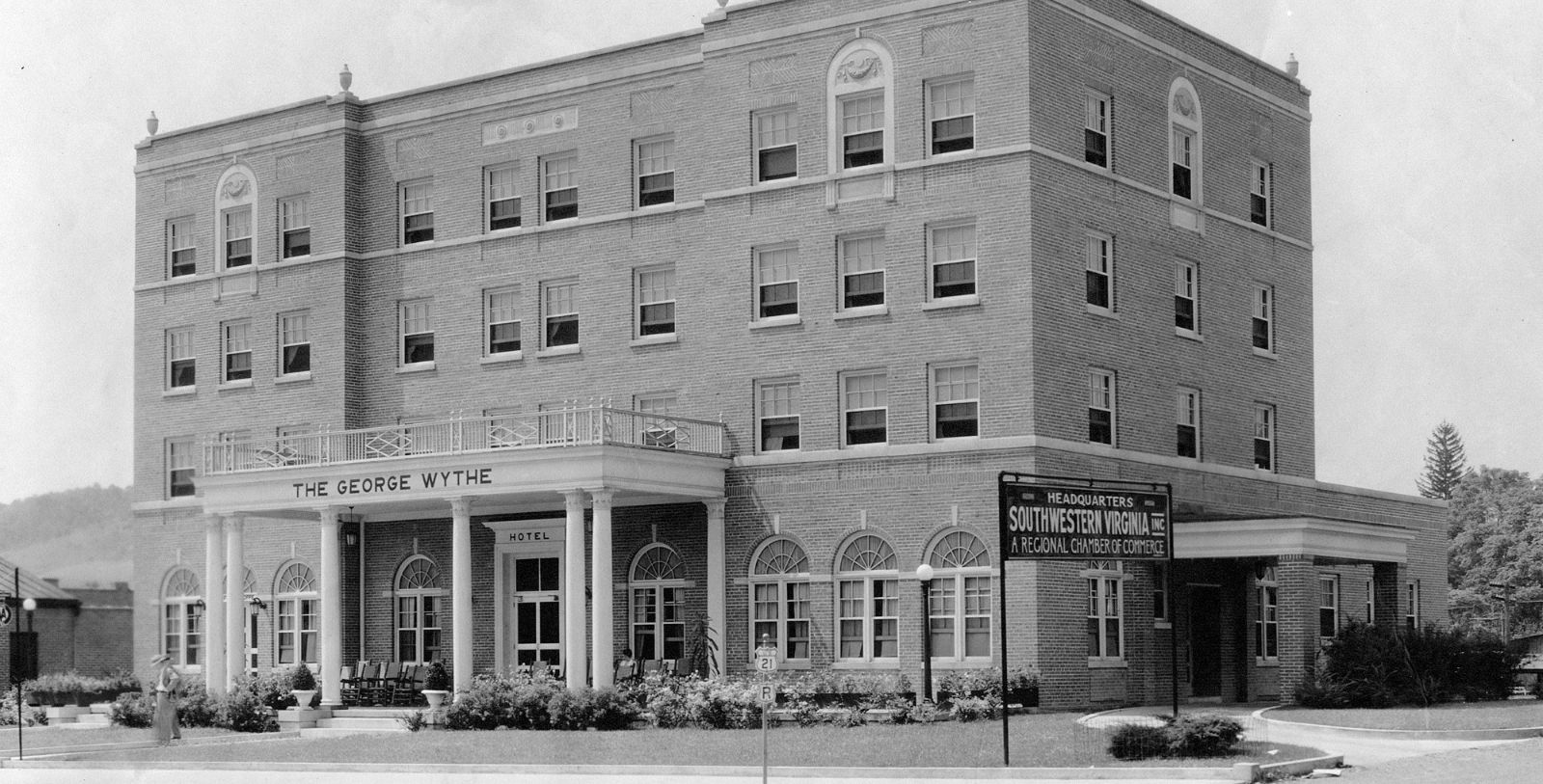 a large brick building with a sign