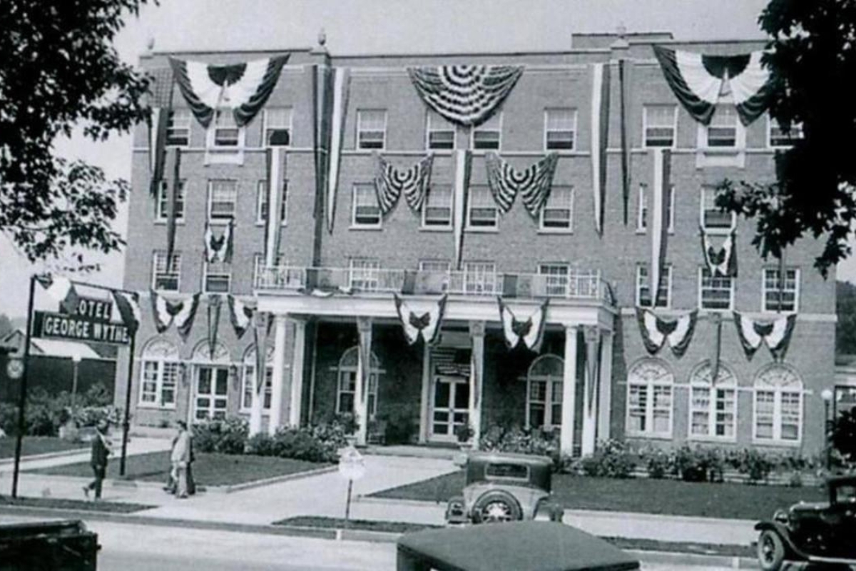a building with flags on the front
