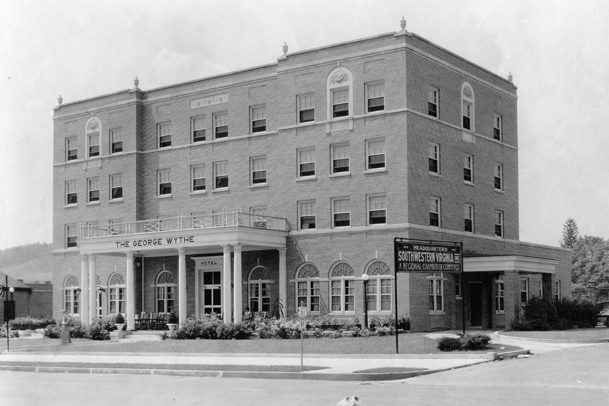 a large brick building with columns