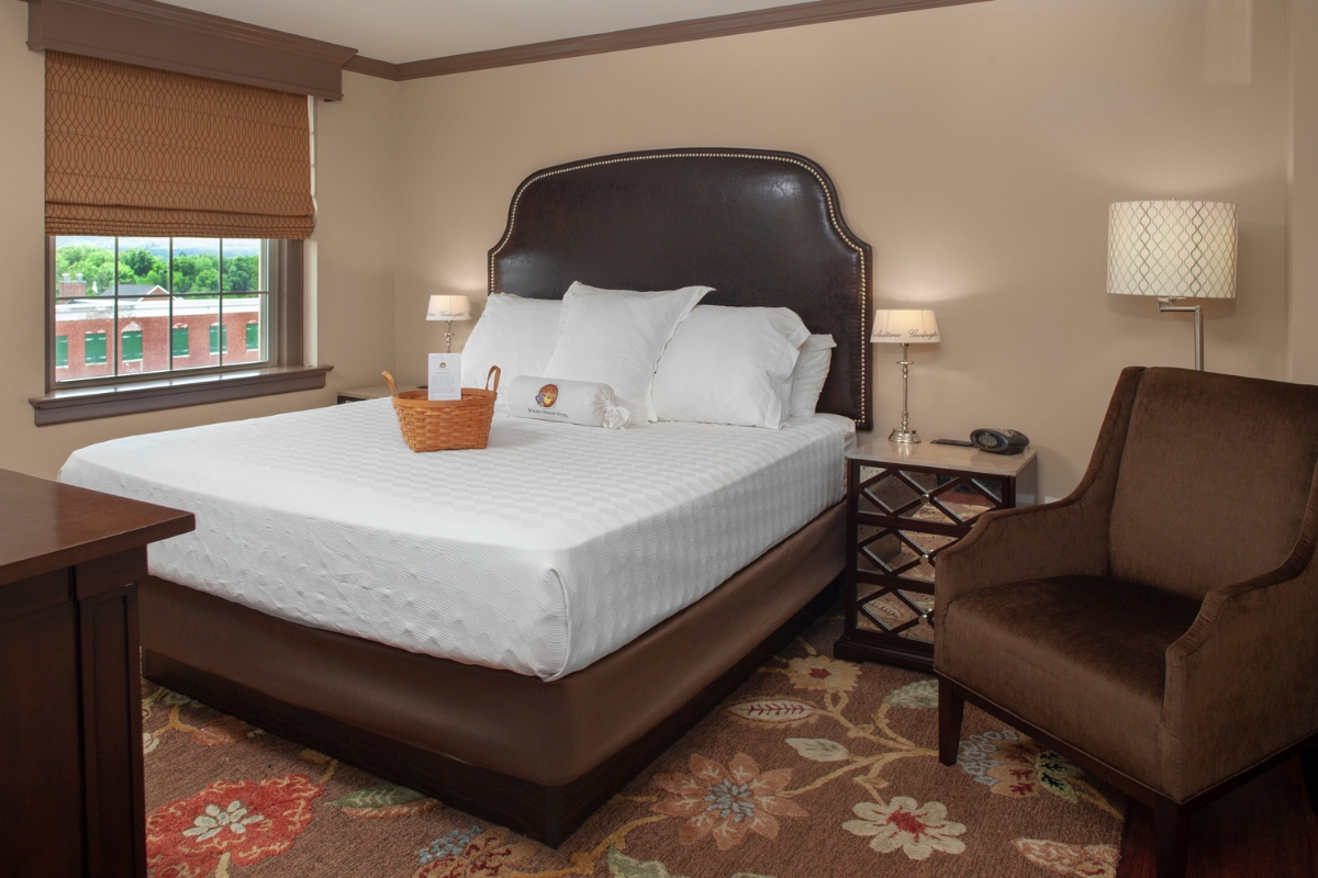 a bed with a basket on it