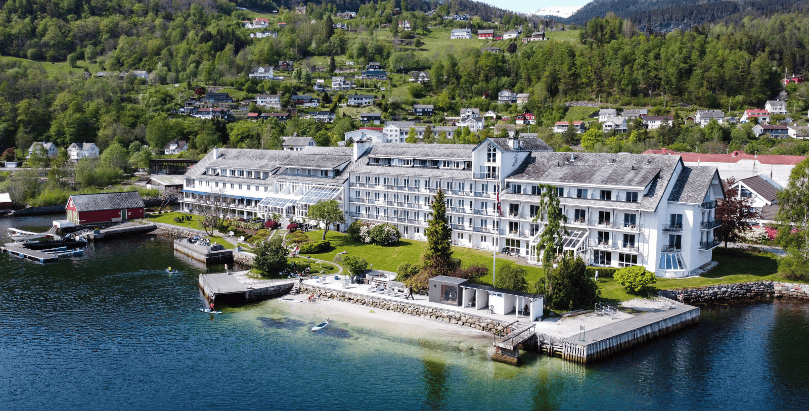 a large building next to a body of water