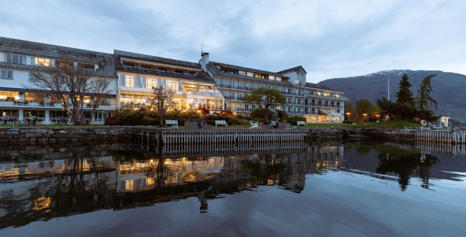 a building next to a body of water
