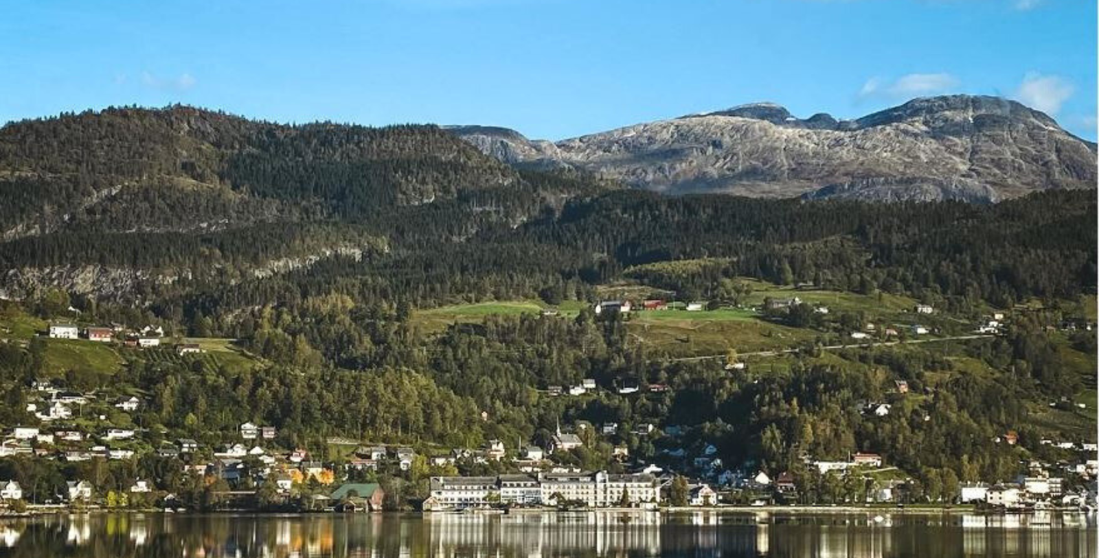 a body of water with a town on the side