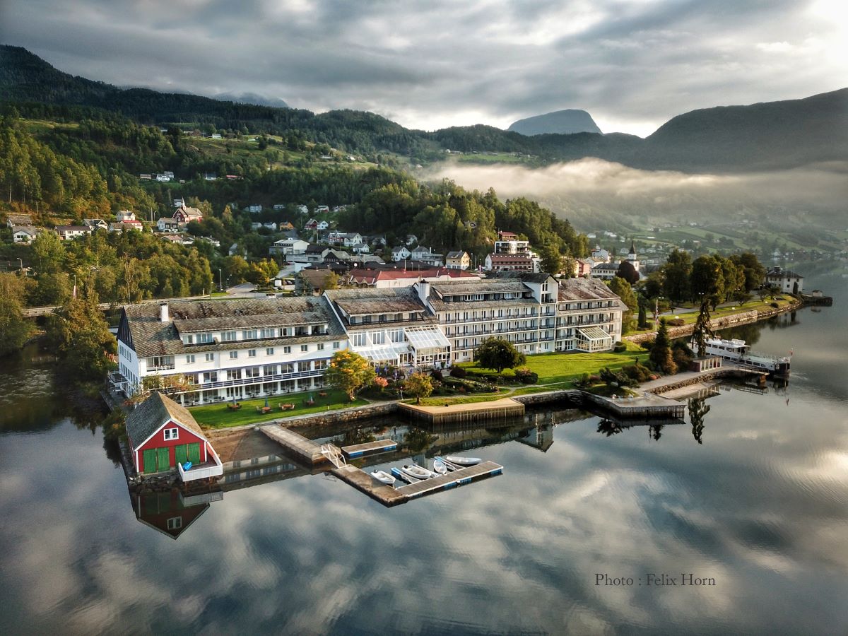 a building next to a body of water