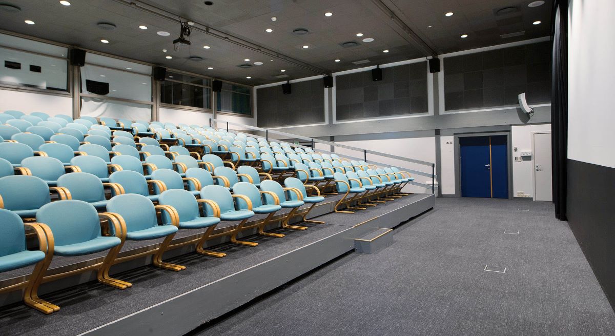 a room with blue chairs