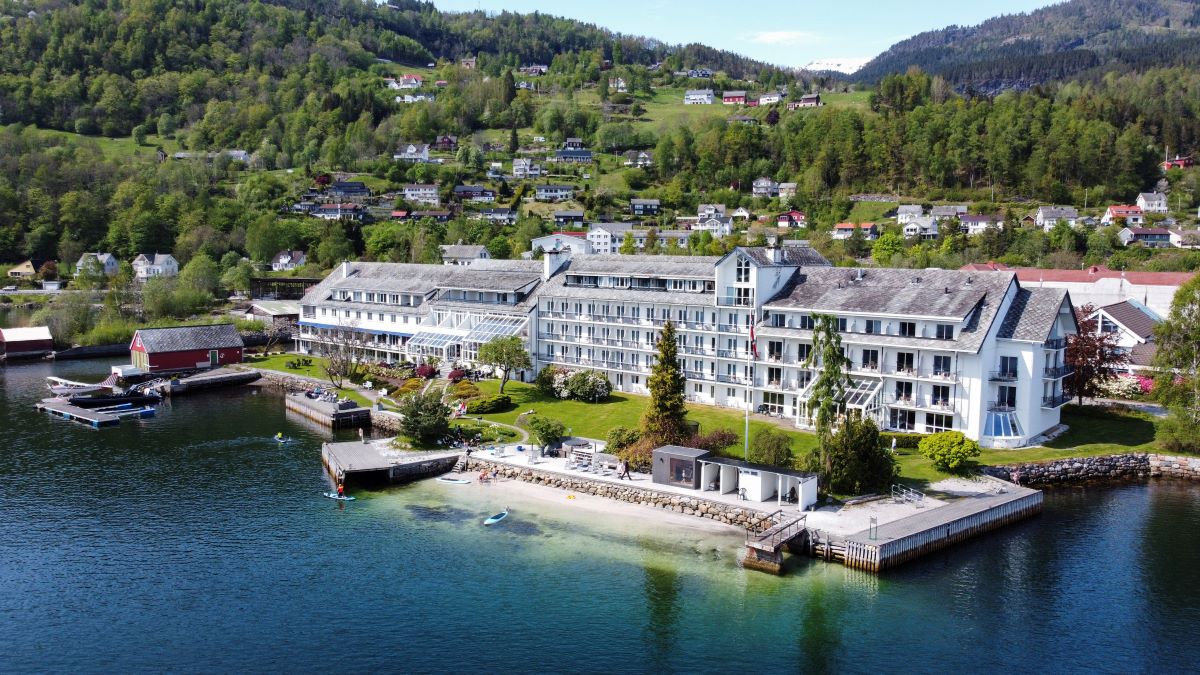 a large building next to a body of water