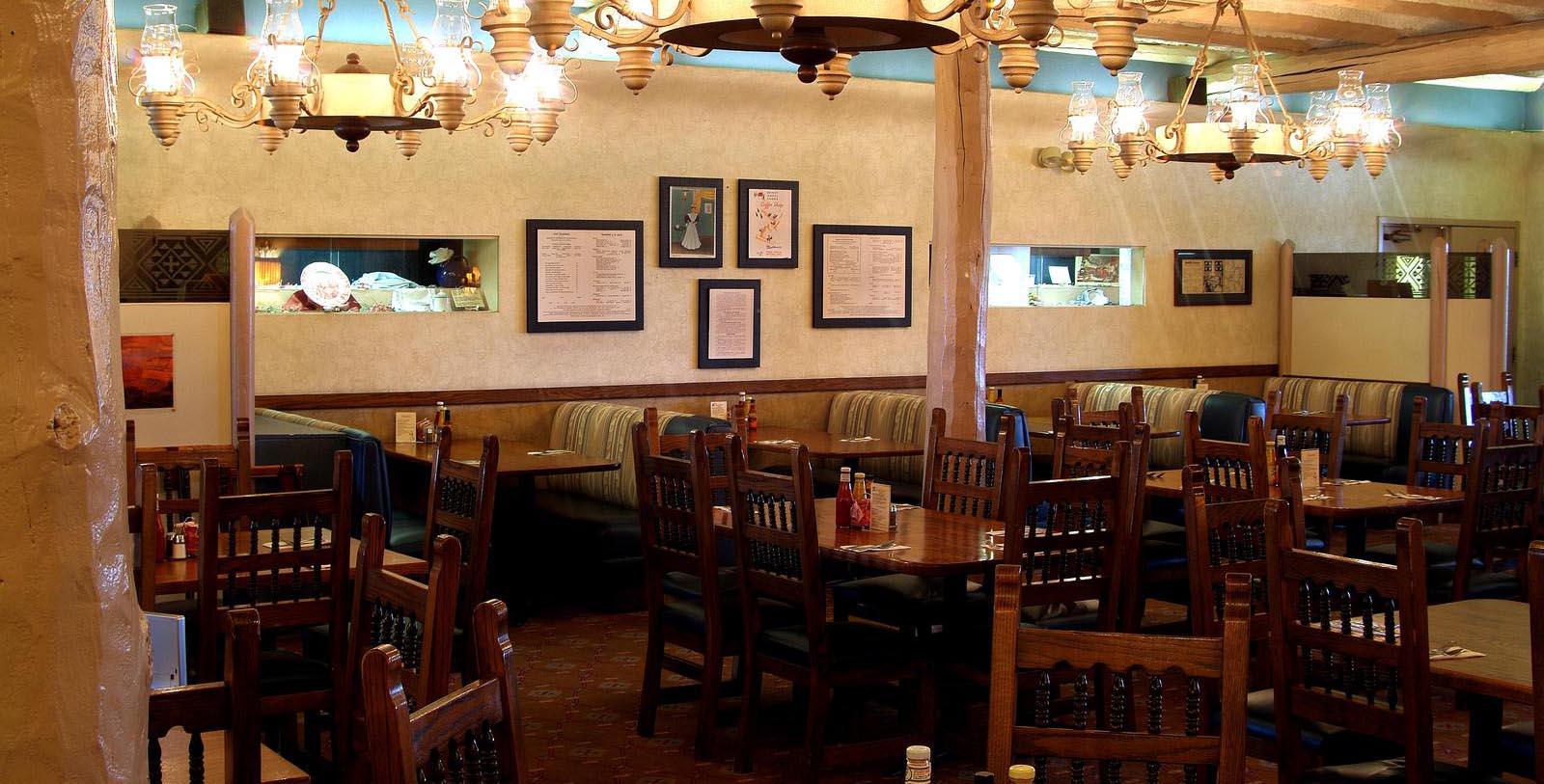 a restaurant with tables and chairs