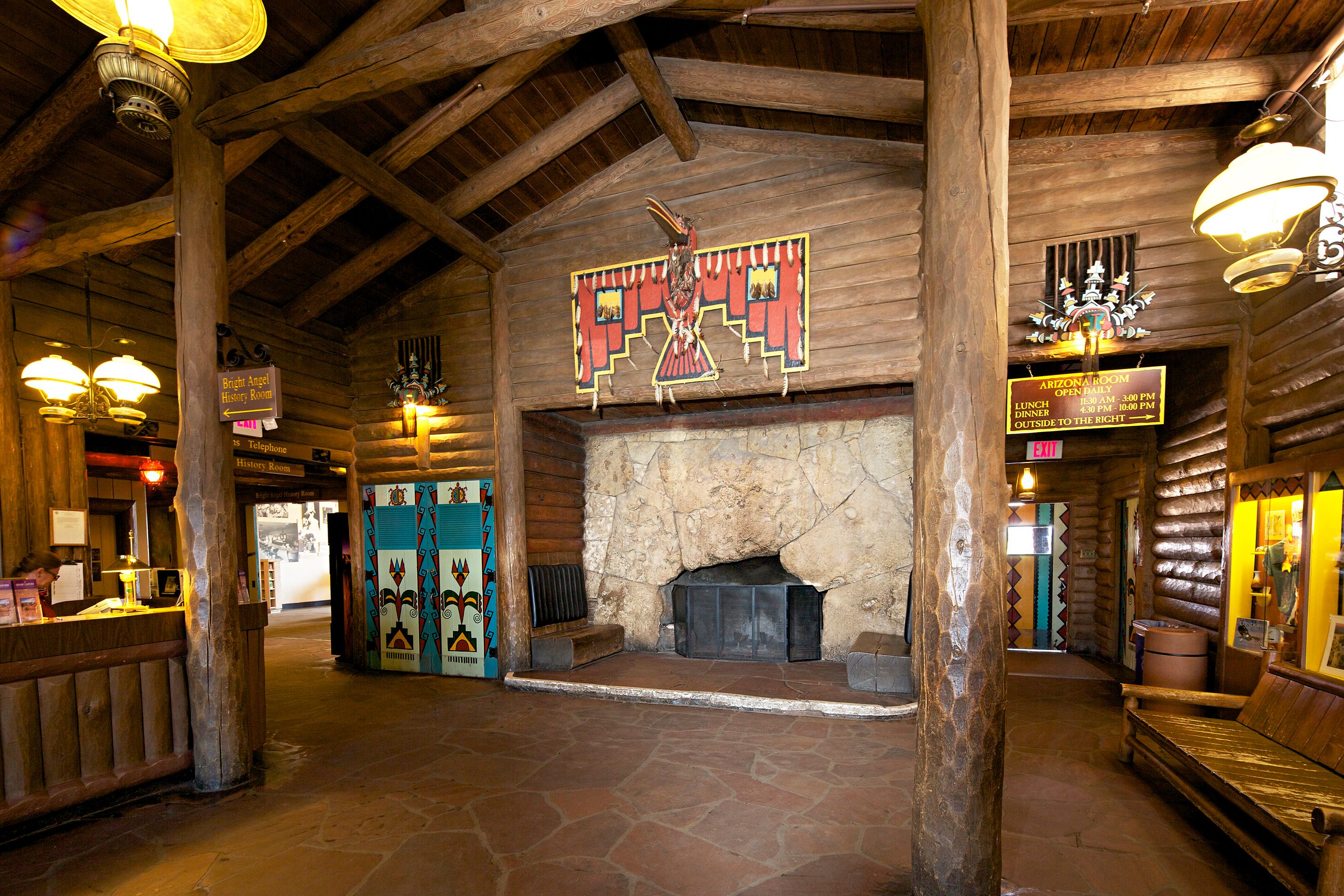 a log cabin with a fireplace