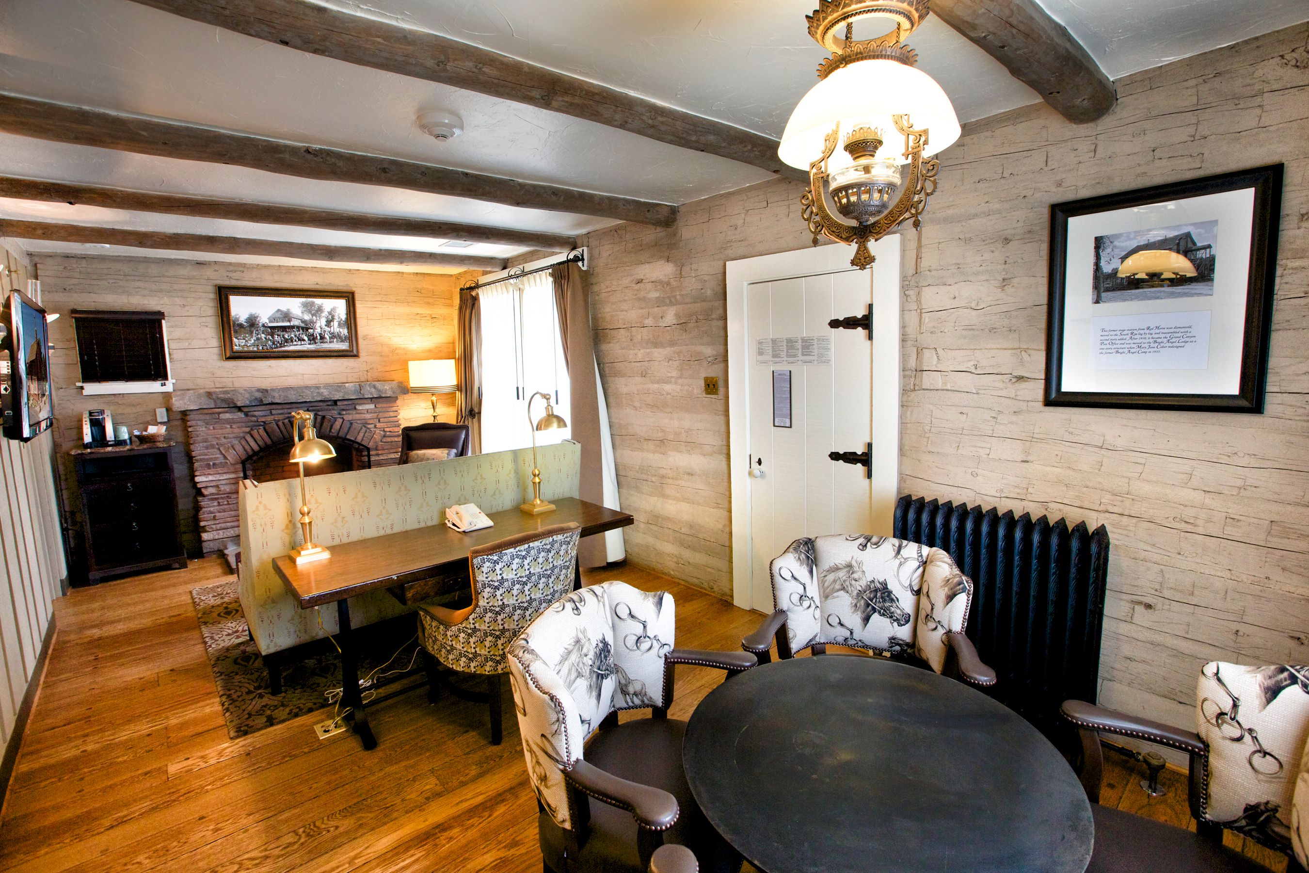 a room with a table and chairs
