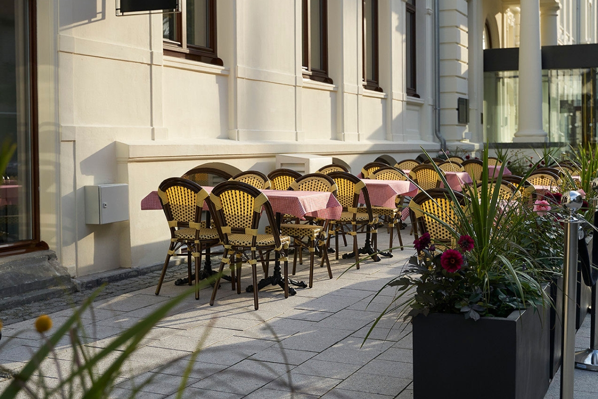 a tables and chairs outside a building