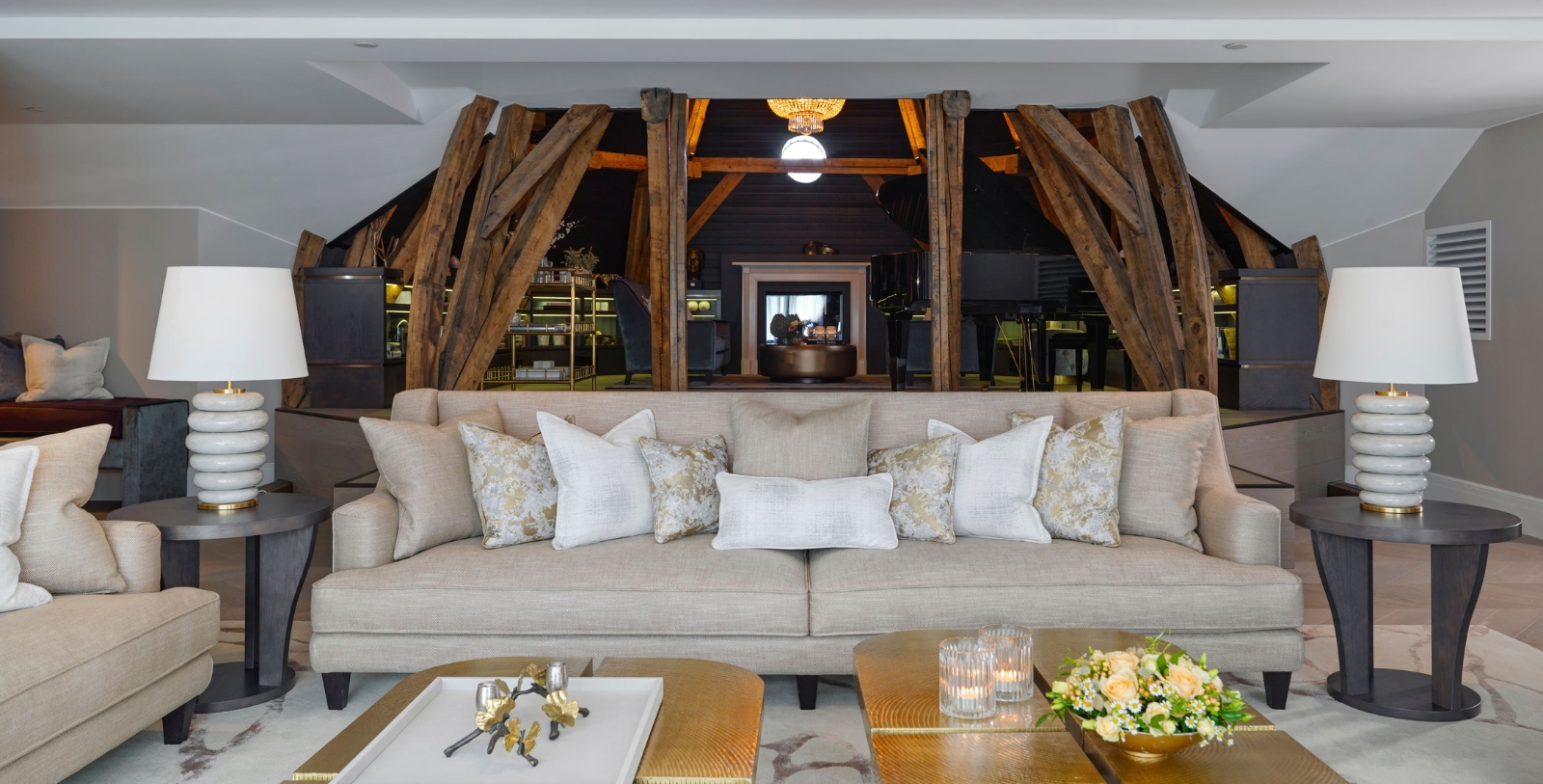 a couch with pillows in a room