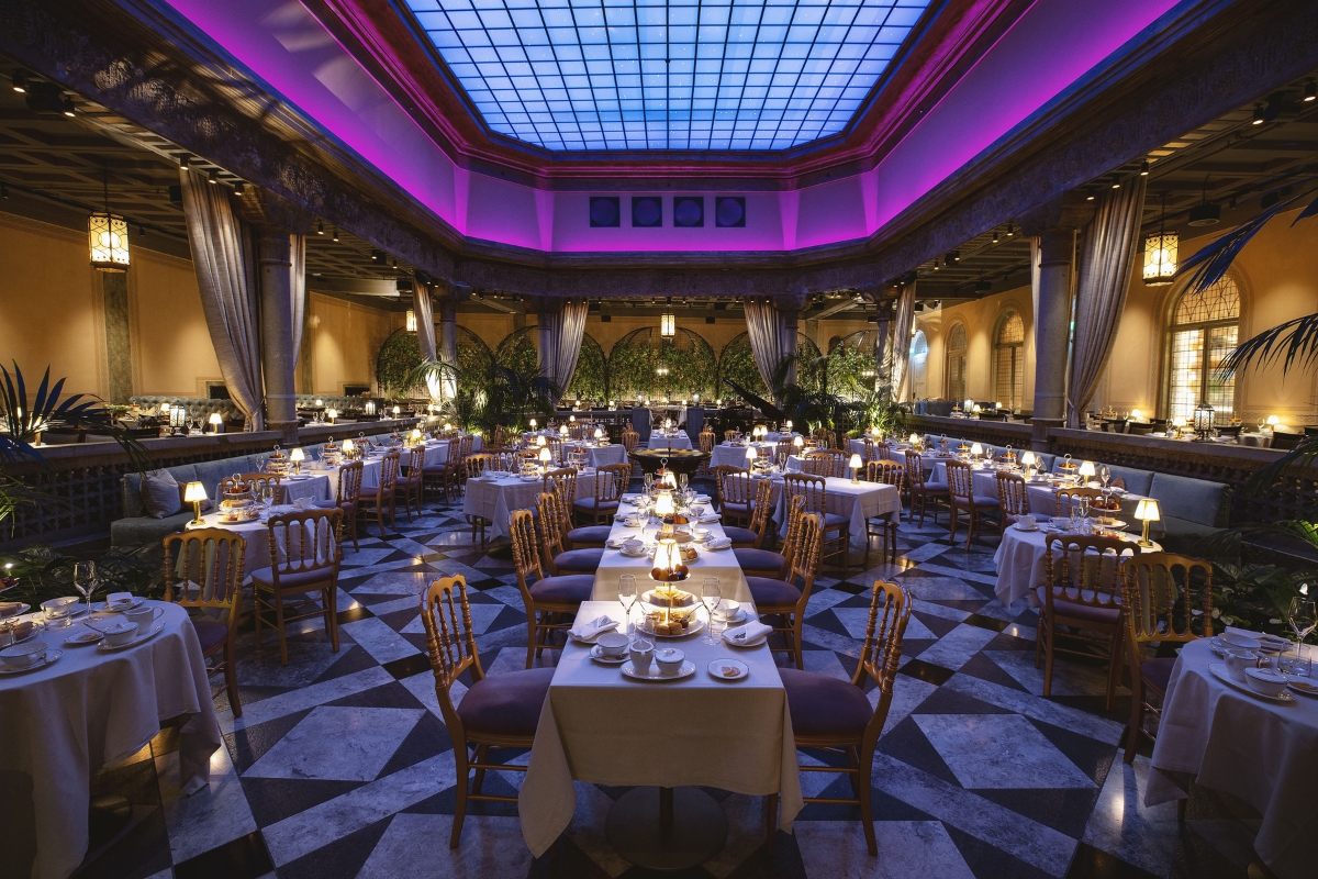 a large room with tables and chairs