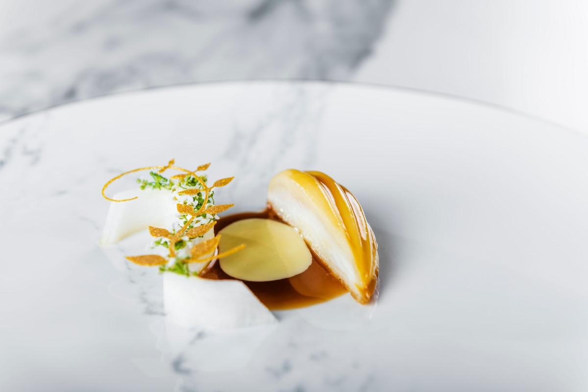 a plate of food on a marble surface