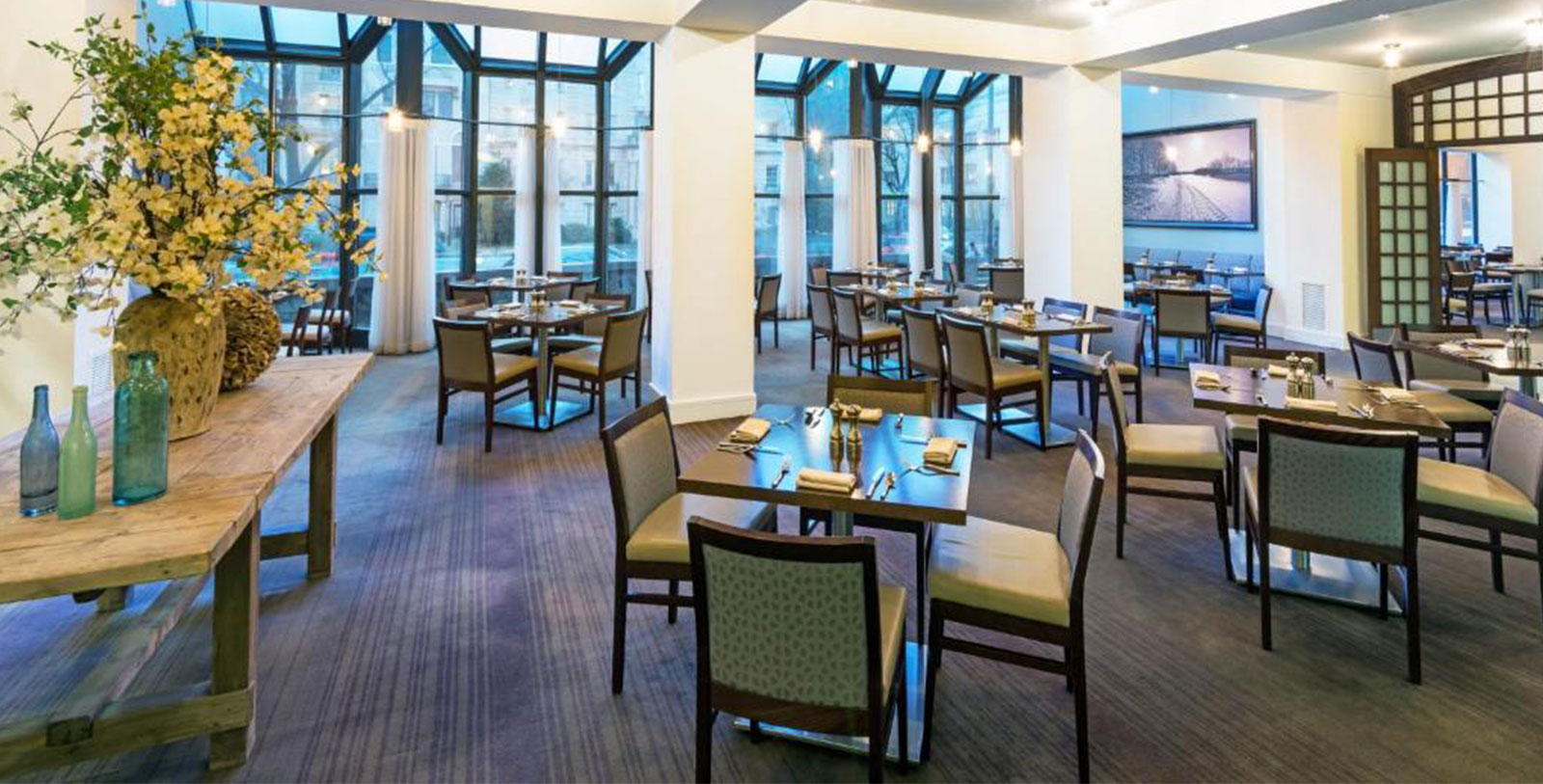a room with tables and chairs