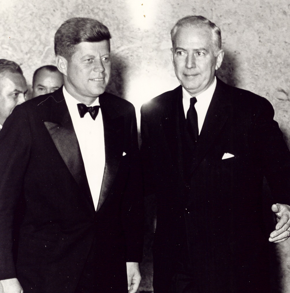 a couple of men in suits