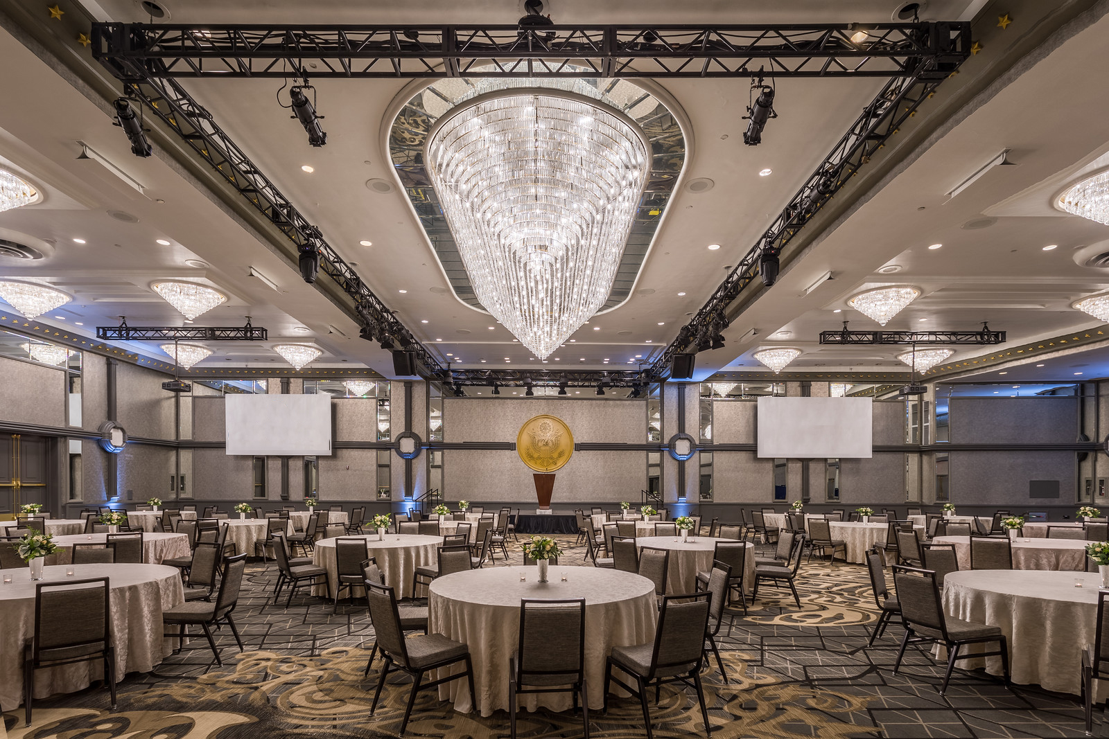 a large room with tables and chairs