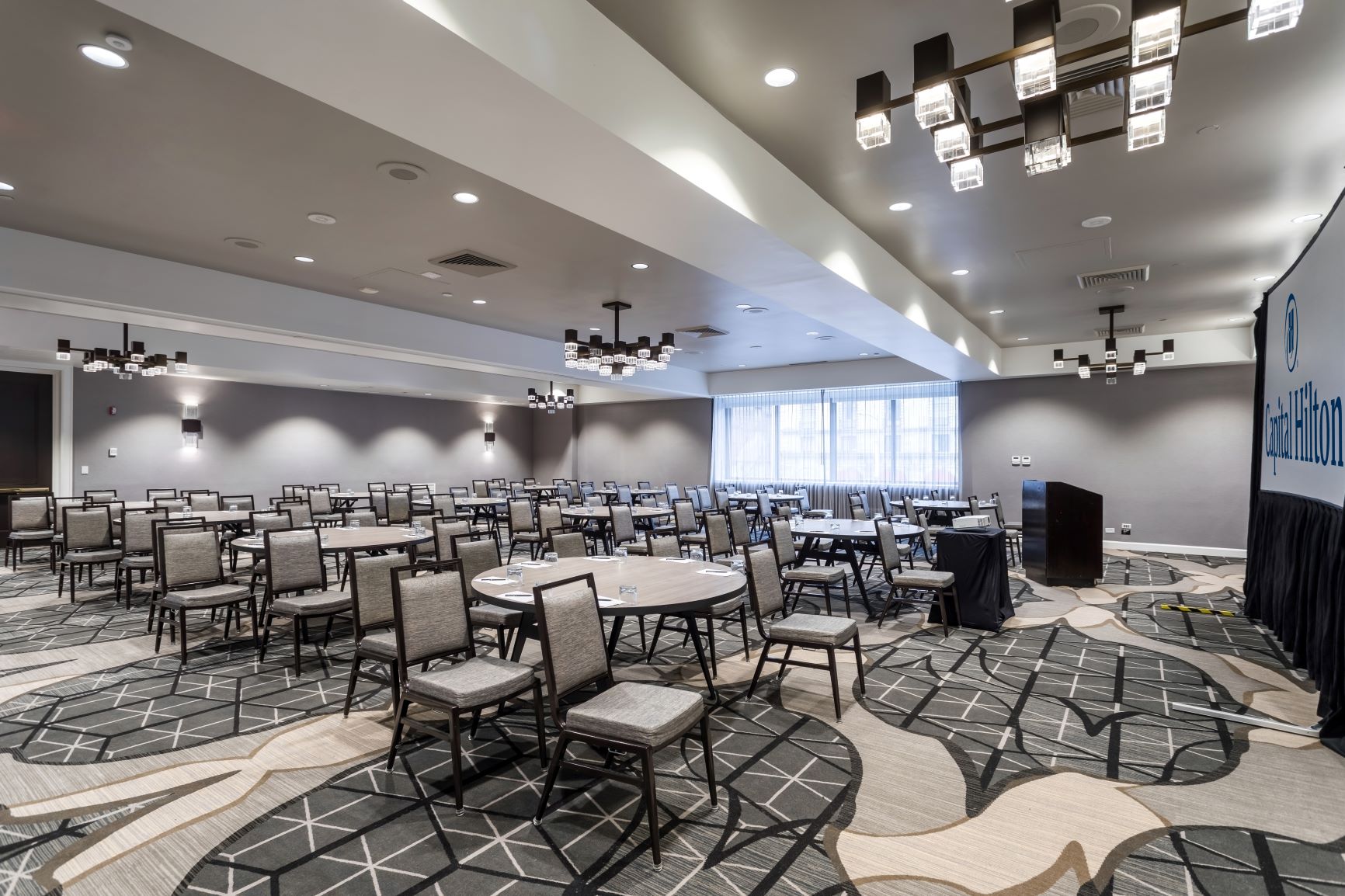 a room with tables and chairs