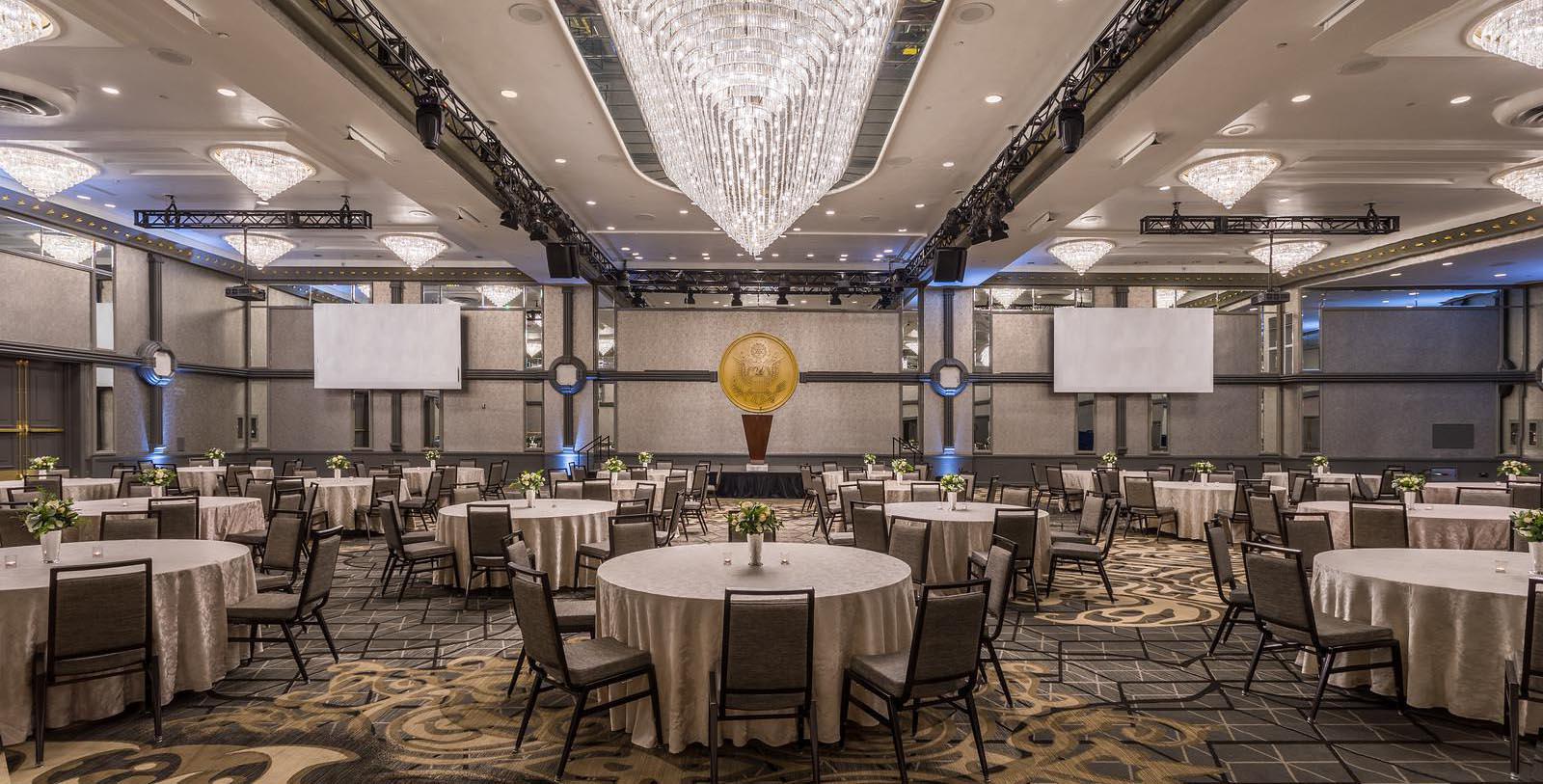 a room with tables and chairs