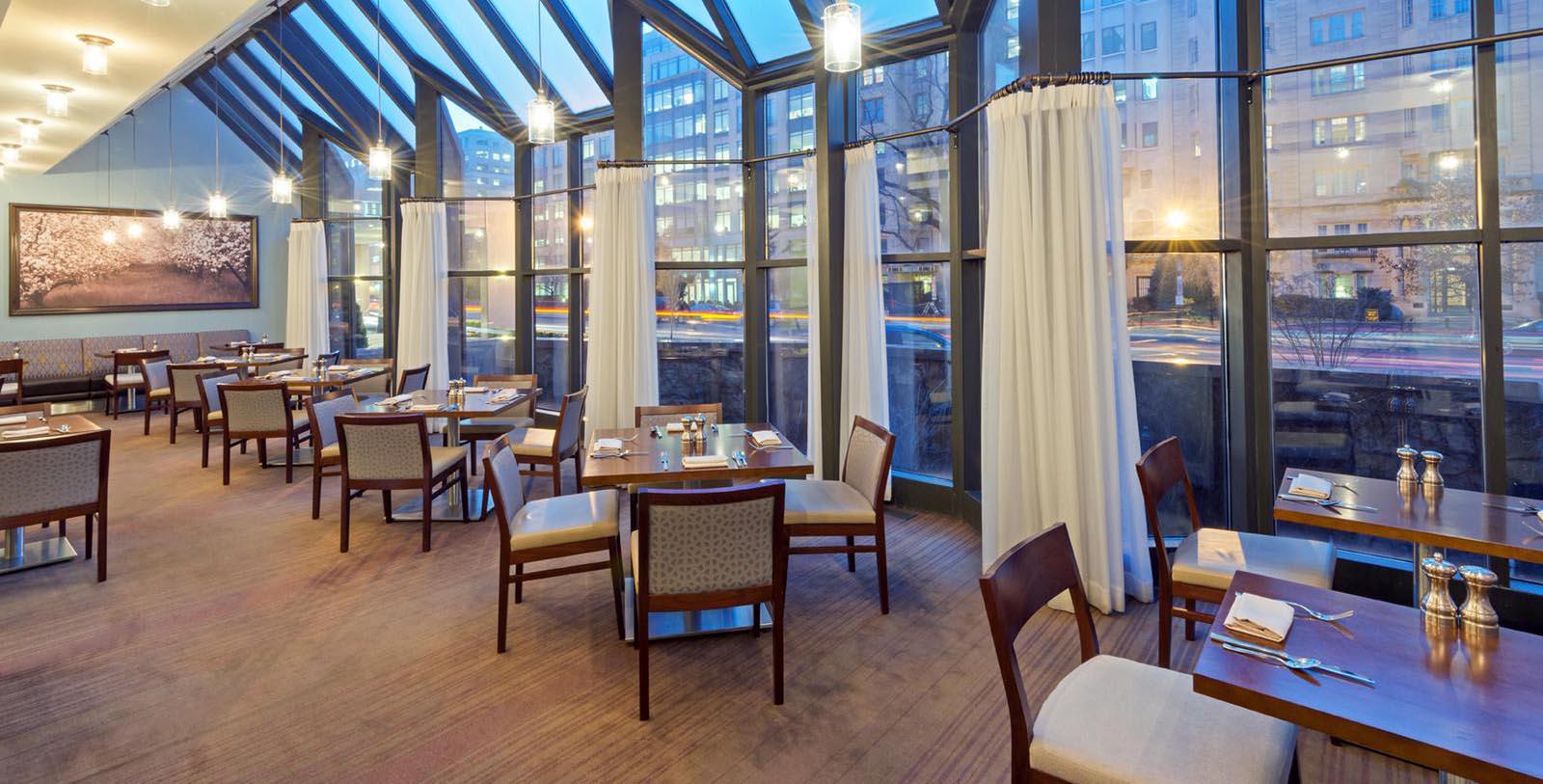 a room with tables and chairs