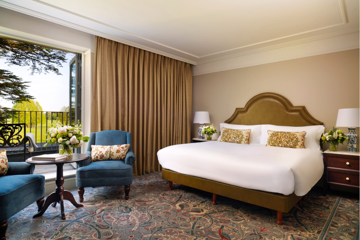 a room with a bed and a chair