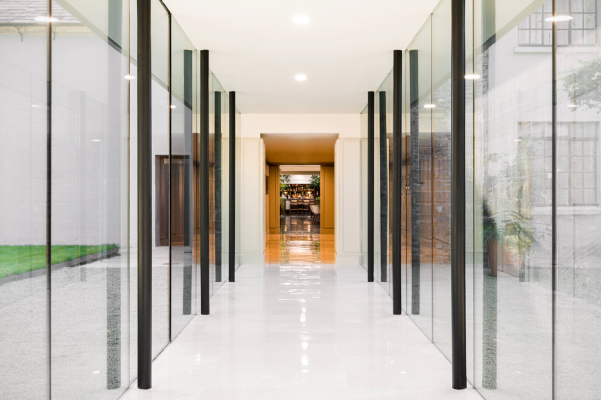 a hallway with glass walls