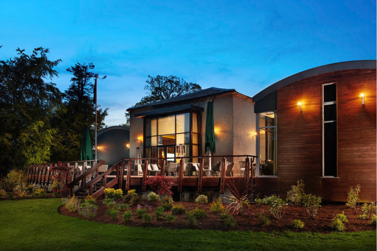 a building with a deck and patio