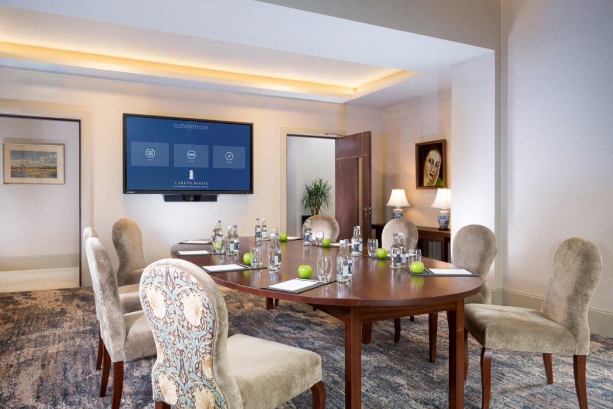 a room with a table and chairs