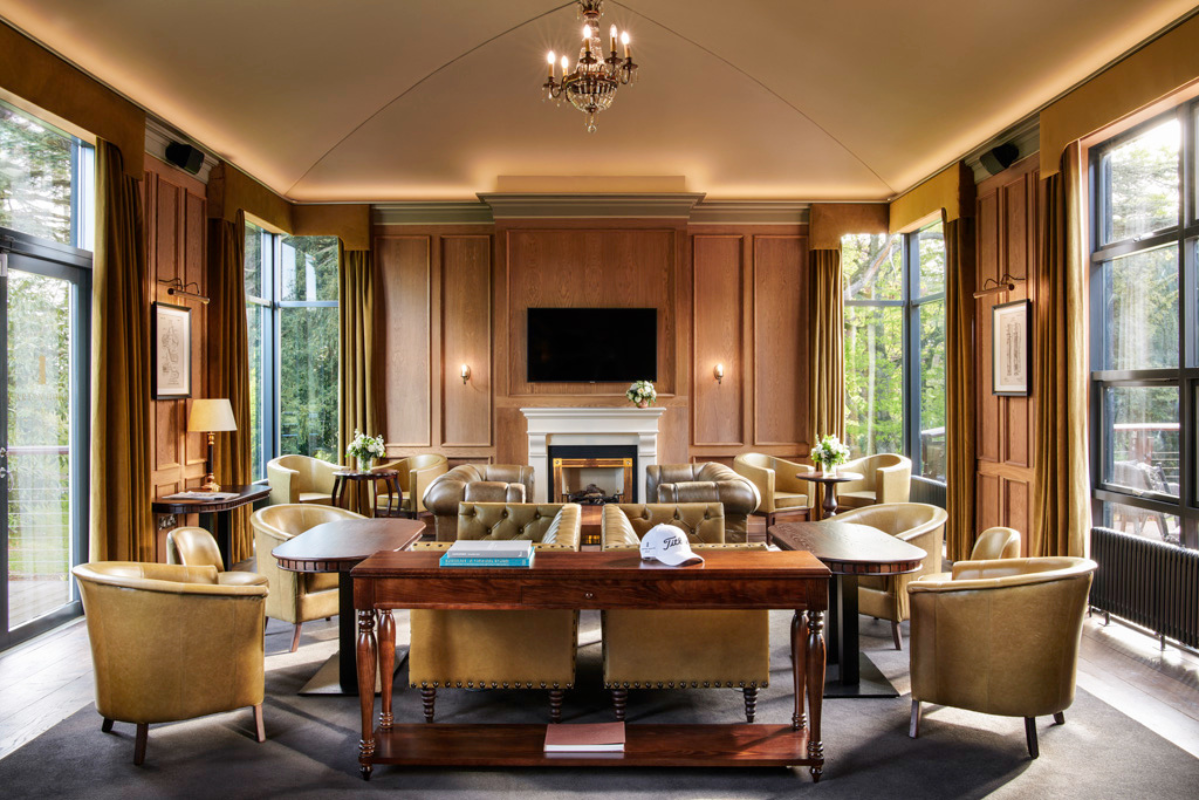 a room with a fireplace and a table
