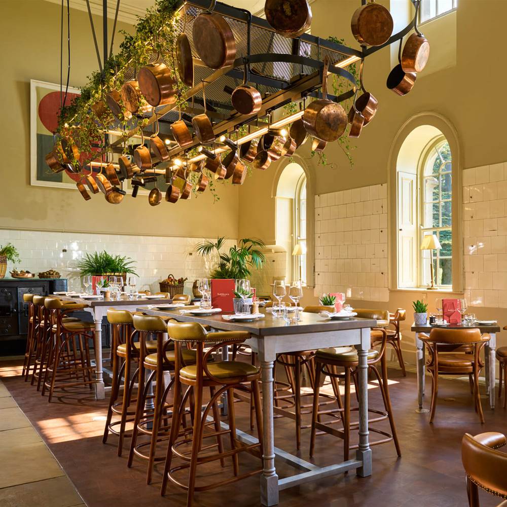 a restaurant with tables and chairs