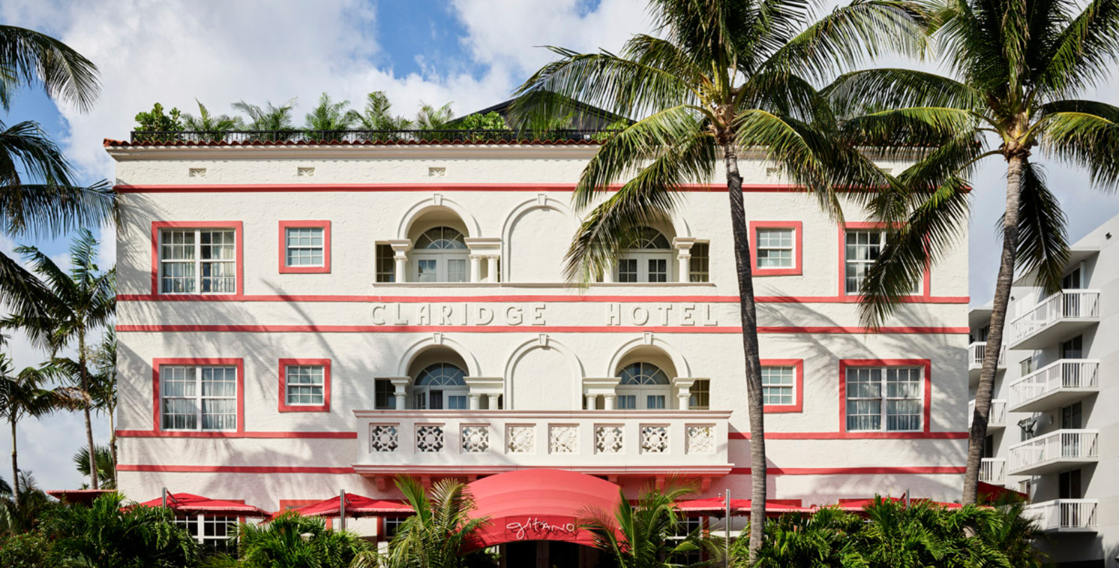 a building with palm trees