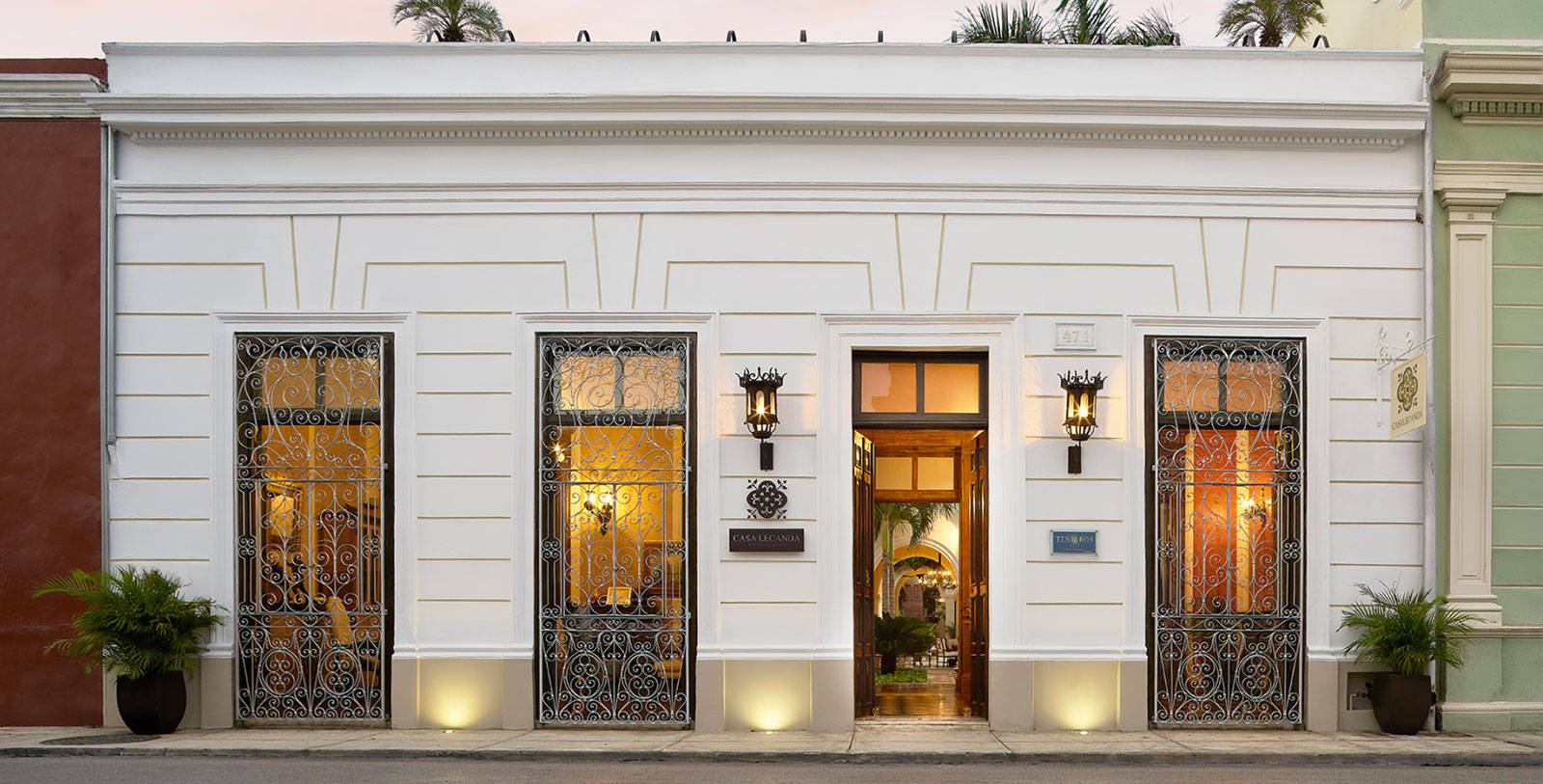 a white building with a door open