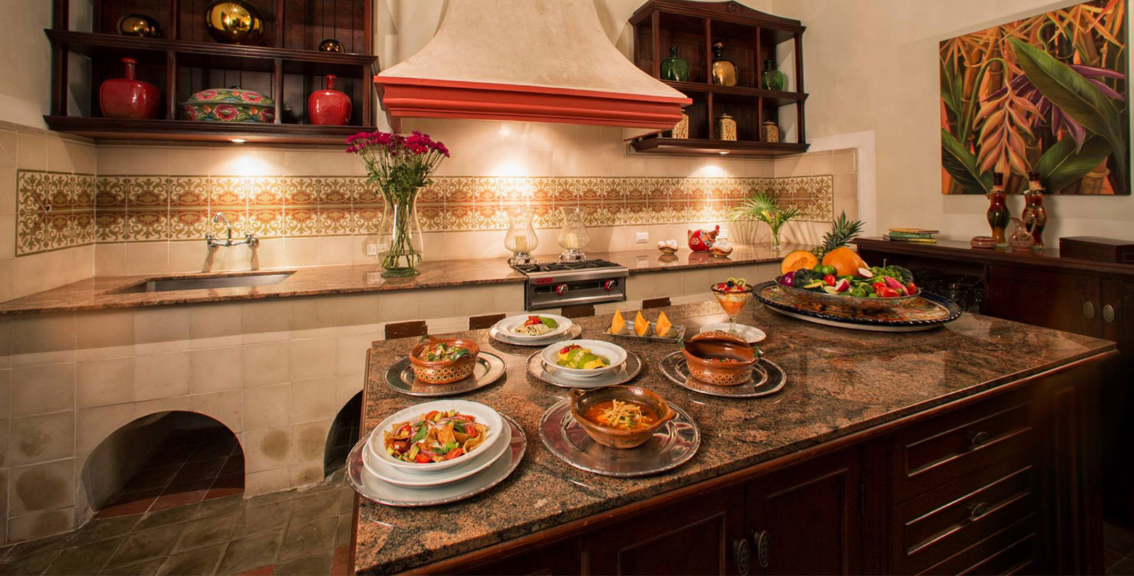 a kitchen with plates of food on a counter