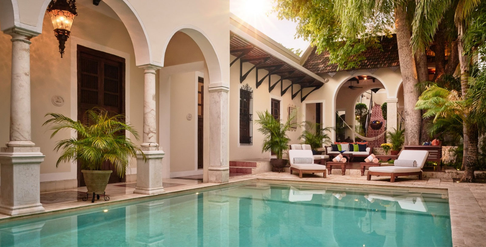 a pool in front of a house