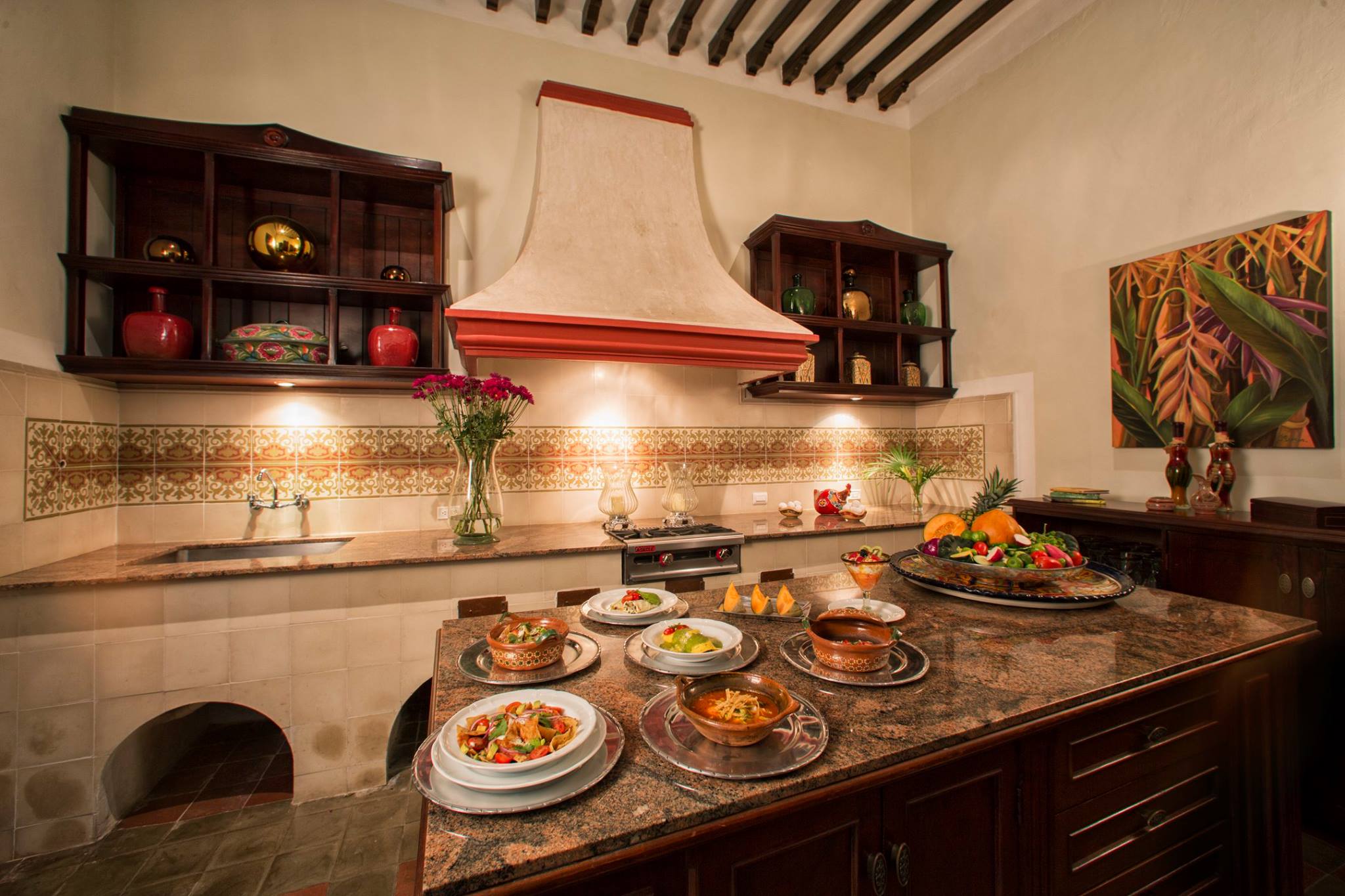 a kitchen with plates of food on a counter