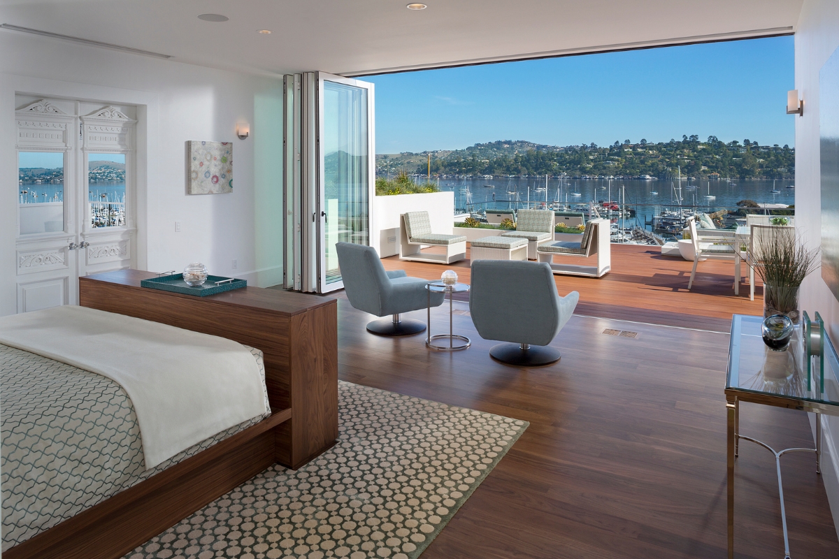 a room with a view of water and a bay