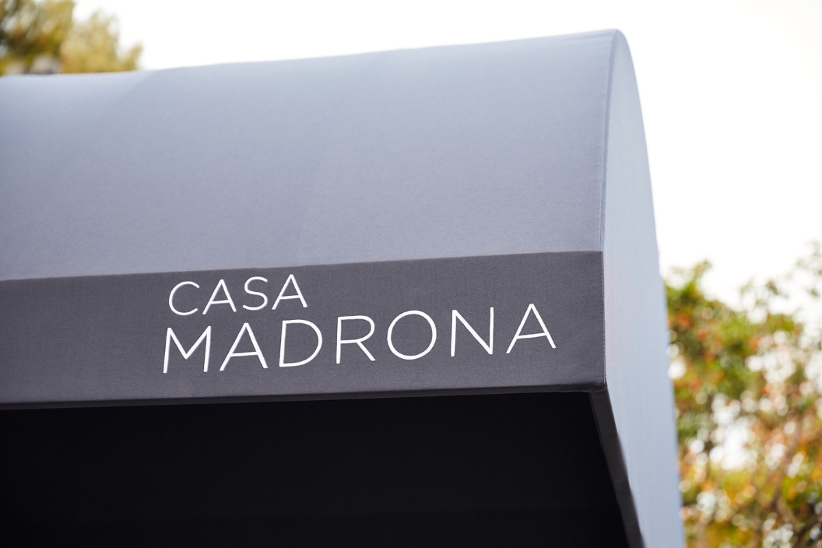 a grey awning with white text