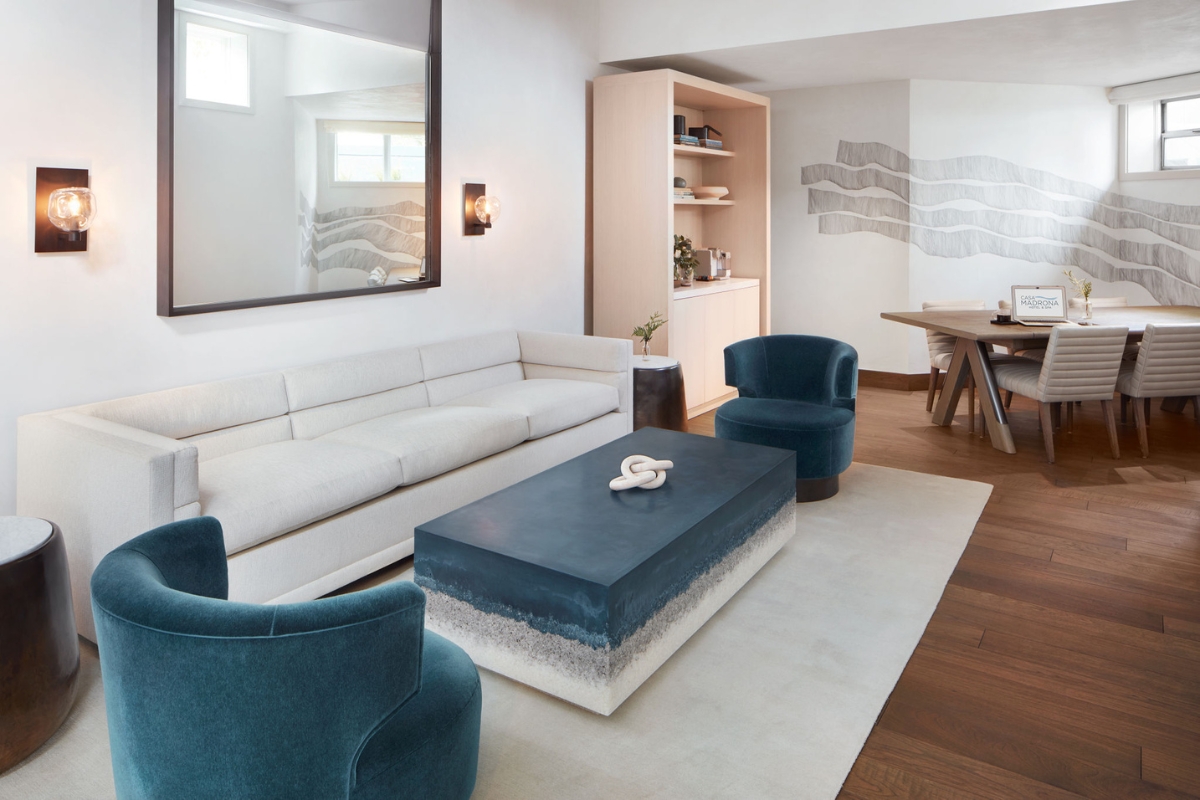 a living room with a couch and a table