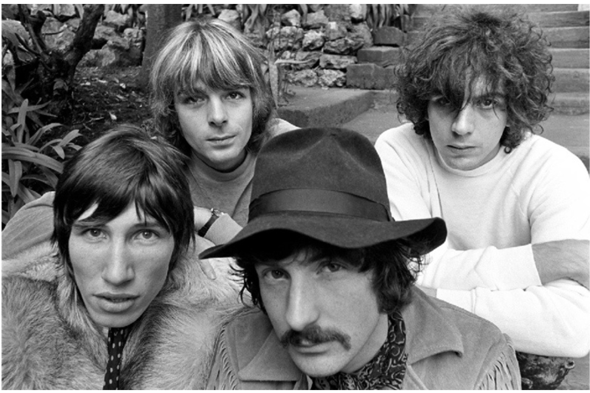 a group of men posing for a photo