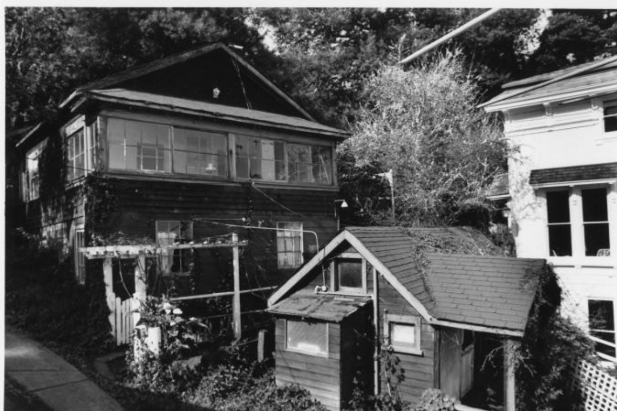 a black and white photo of a house