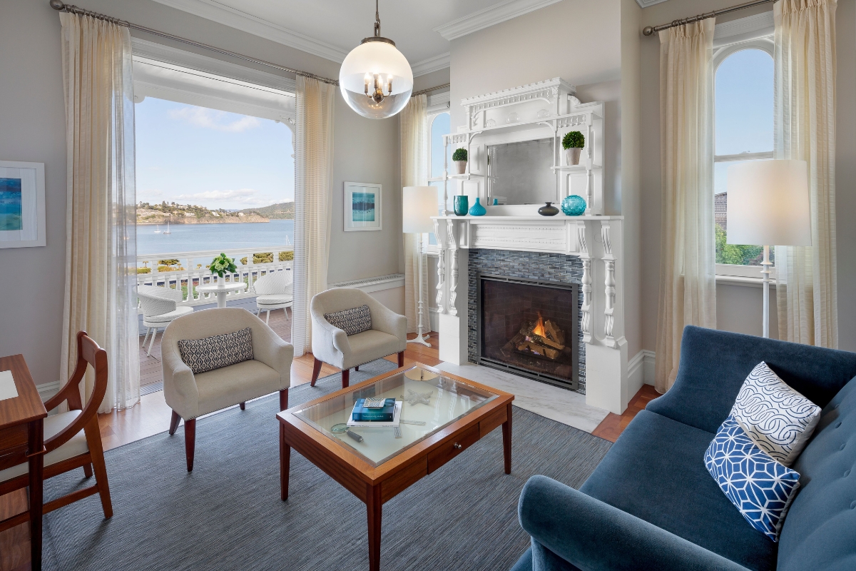 a living room with a fireplace and a couch