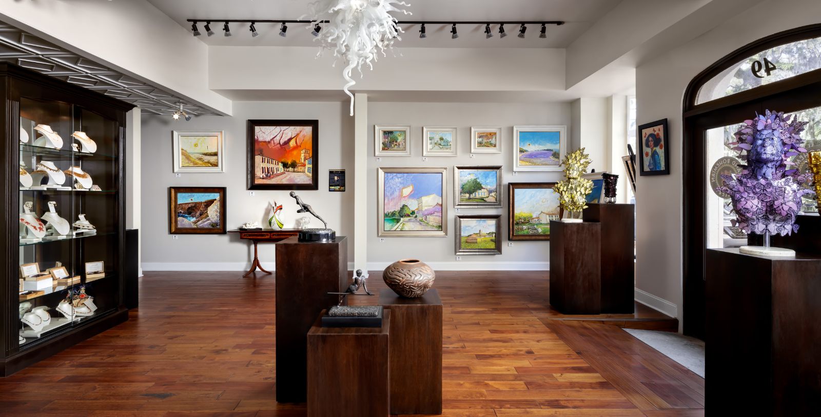 a room with art and paintings on the wall