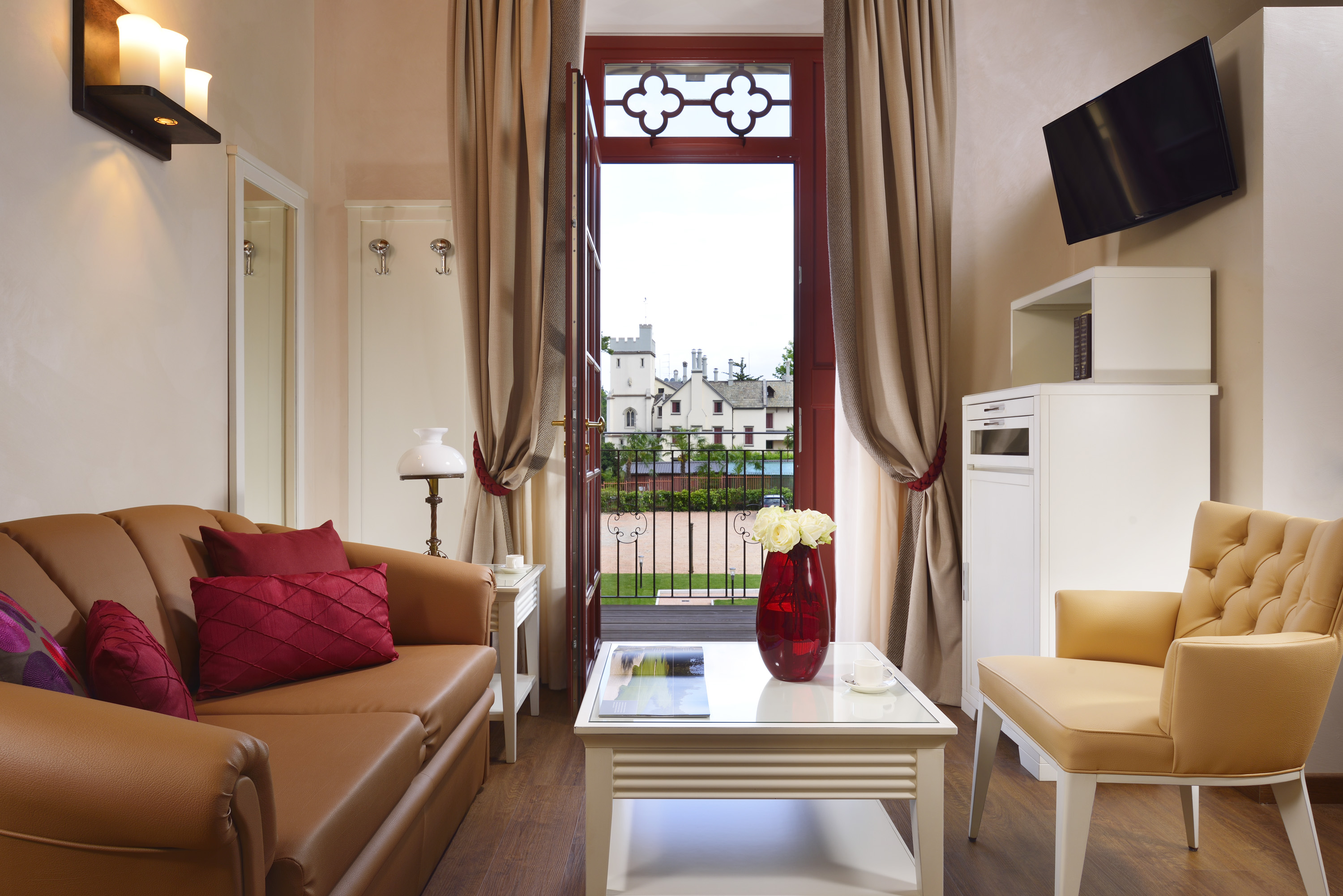 a living room with a couch and a tv