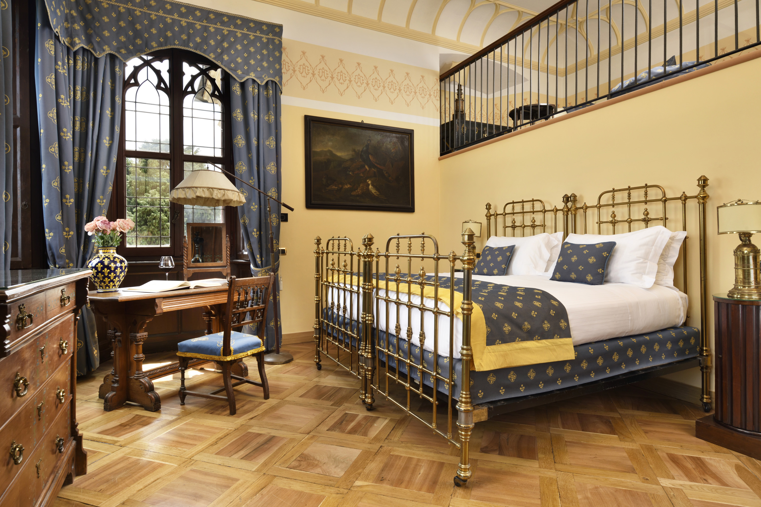 a bedroom with a bed and desk