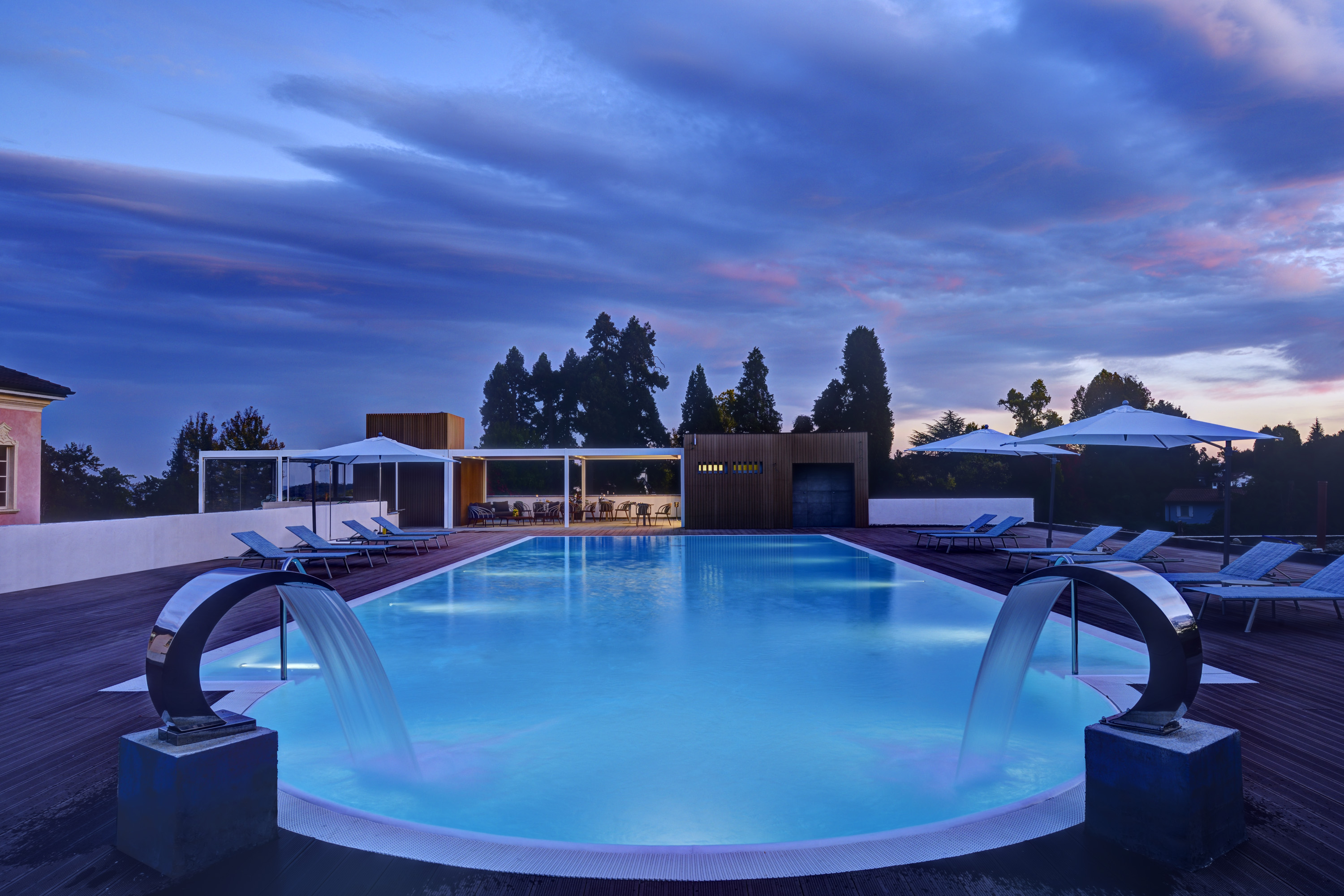 a pool with water falling into it