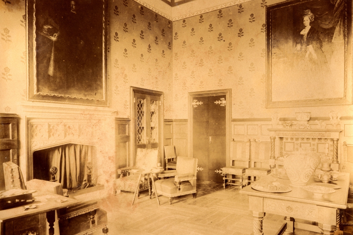 a room with a door and chairs