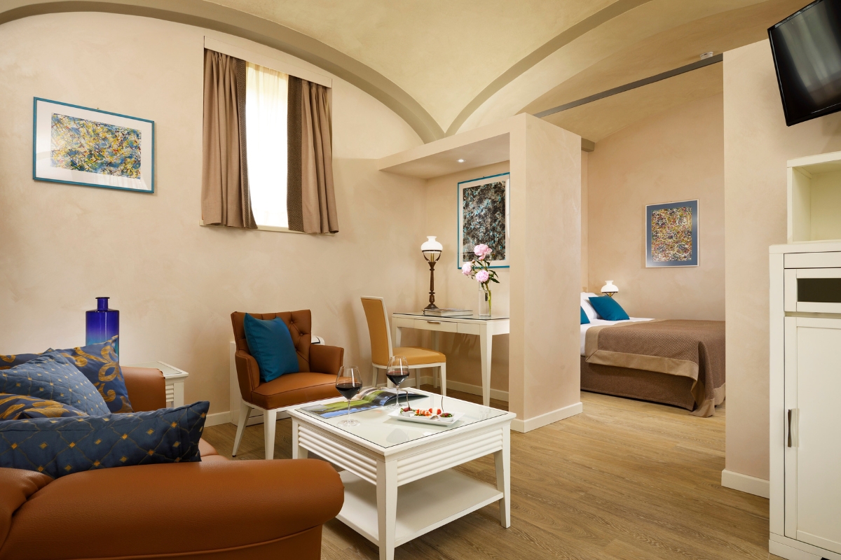 a room with a bed and a couch